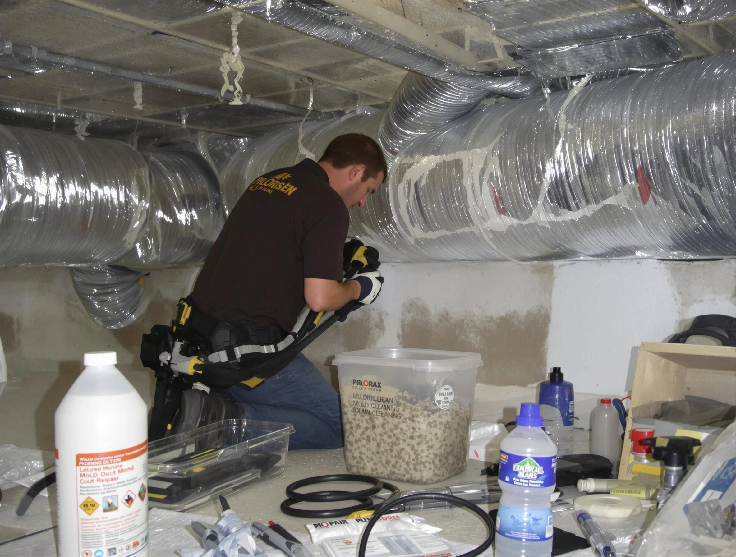 Loveland Air Duct Cleaning specialist performing professional mold removal from air ducts in Loveland